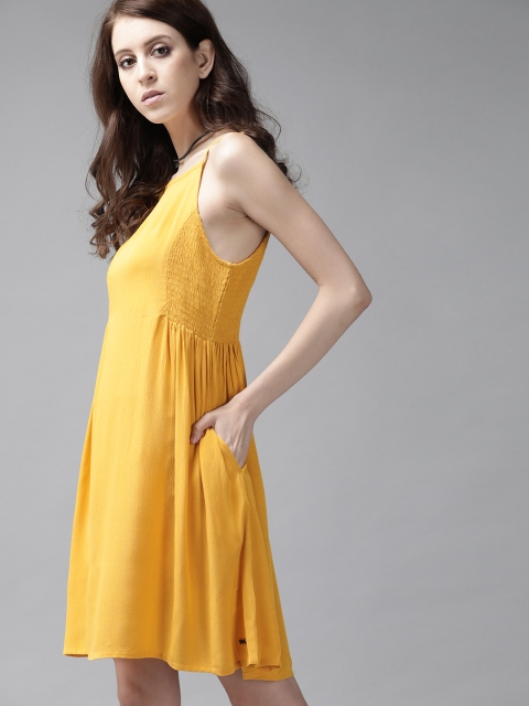 

The Roadster Lifestyle Co GreenTurn Women Mustard Yellow Eco Friendly Viscose Solid Smocked A-Line Sustainable Dress