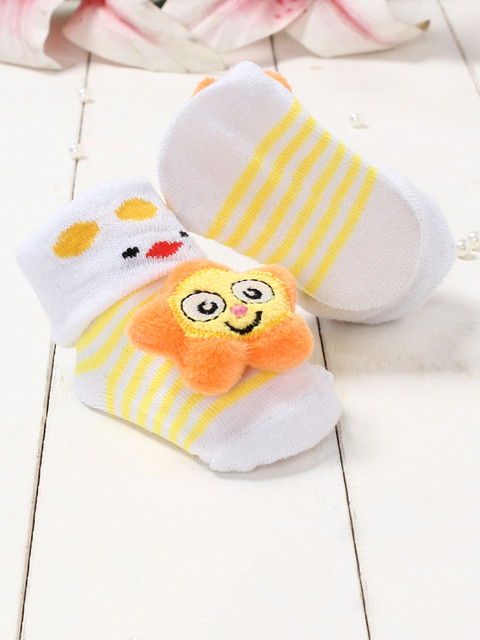 

Walktrendy Kids White & Yellow Printed Booties with Applique Details