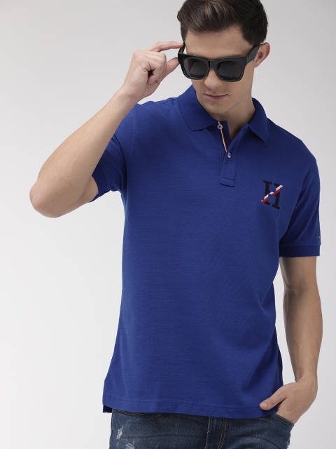 

Tommy Hilfiger Men Blue Solid Polo Collar T-shirt