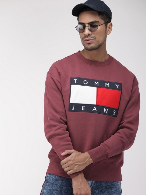 

Tommy Hilfiger Men Burgundy Solid Embroidered Sweatshirt