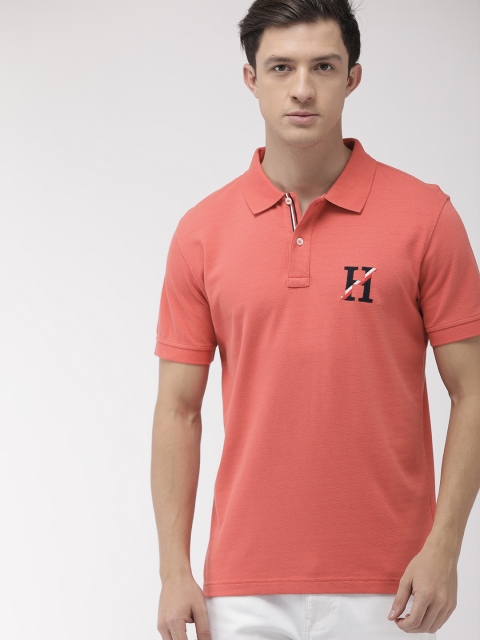 

Tommy Hilfiger Men Coral Pink Solid Polo Collar T-shirt