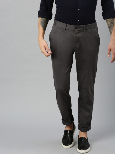 

Tommy Hilfiger Men Grey Regular Fit Solid Regular Trousers