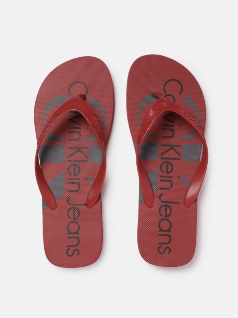 

Calvin Klein Men Red Printed Thong Flip-Flops