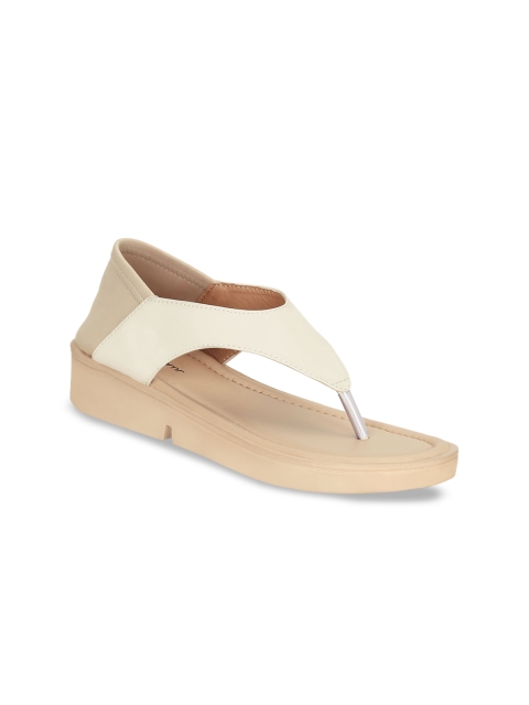 

Get Glamr Women Beige Solid Heels