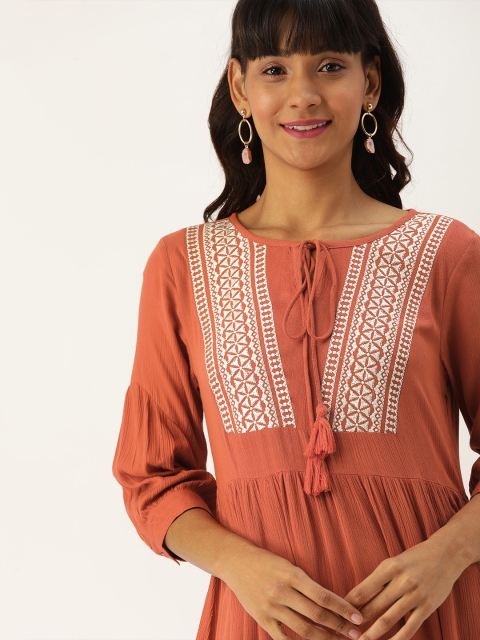 

DressBerry Women Rust Orange Solid Fit and Flare Dress with Crochet Inserts