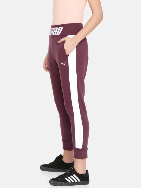 

Puma Women Burgundy Solid Straight Fit Drycell MODERN SPORT Joggers With Side Stripes