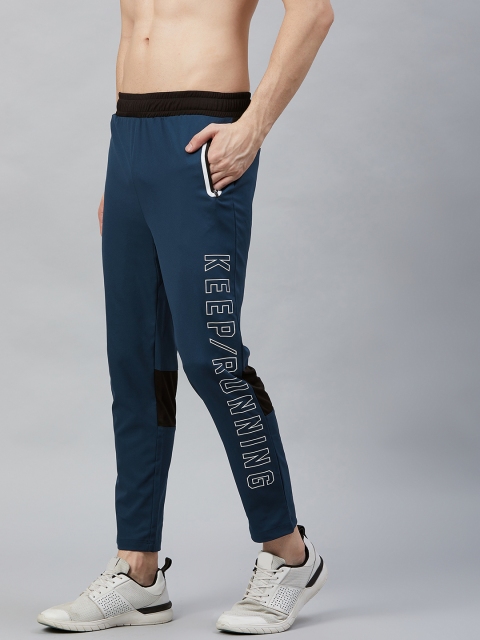 

HRX by Hrithik Roshan Men Moonlit Ocean Slim Fit Rapid-Dry Running Track Pants, Navy blue