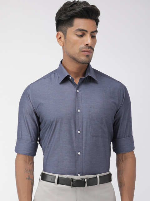 

Raymond Men Blue Slim Fit Solid Formal Shirt
