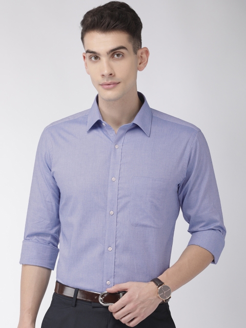 

Raymond Men Blue Solid Slim Fit Formal Shirt