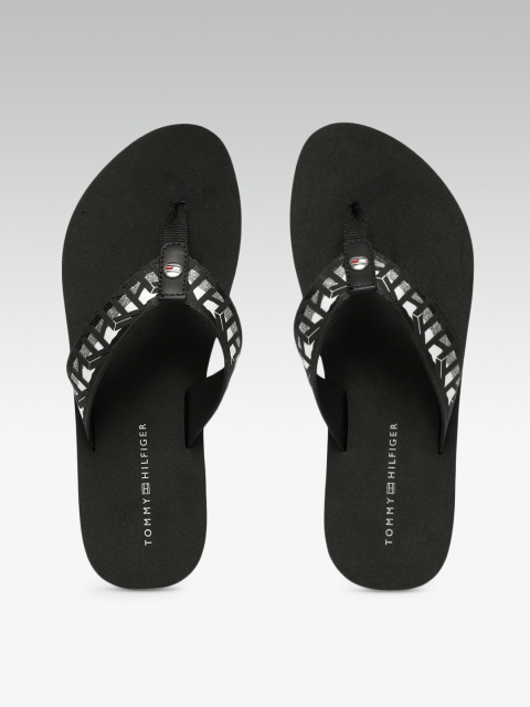 

Tommy Hilfiger Women Black Solid Flip Flops