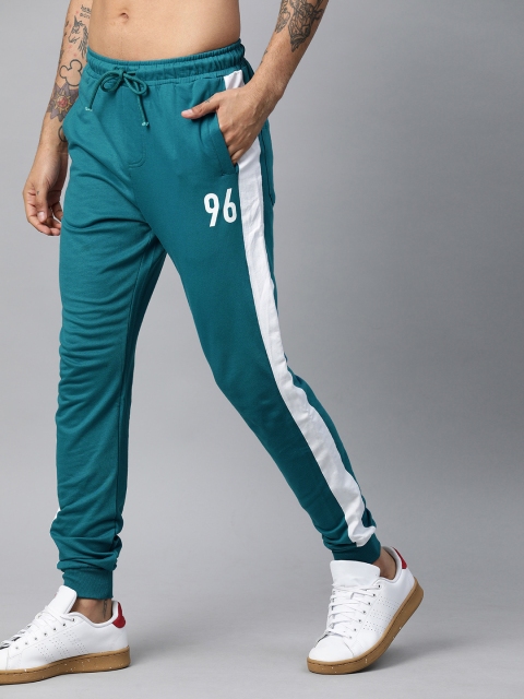 

Kook N Keech Men Teal Blue Solid Slim Fit Joggers With Side Stripes