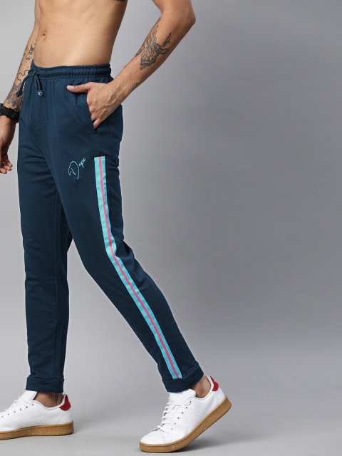 

Kook N Keech Men Teal Blue Solid Track Pants With Side Stripes