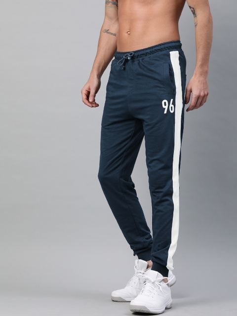 

Kook N Keech Men Teal Blue Solid Straight Fit Joggers With Side Stripes