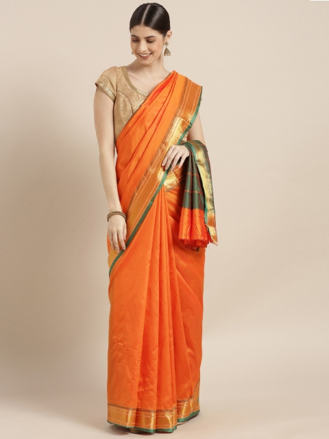 

Sugathari Orange Silk Blend Solid Banarasi Saree