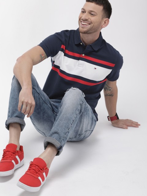 

Tommy Hilfiger Men Navy Blue & White Slim Fit Striped Polo Collar T-shirt