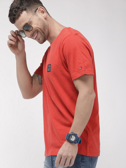

Tommy Hilfiger Men Orange Solid Round Neck T-shirt