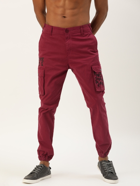 

Moda Rapido Men Maroon Regular Fit Solid Joggers with Printed Detailing