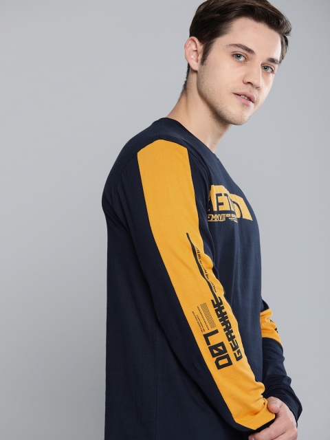 

Difference of Opinion Men Navy Blue & Mustard Yellow Printed Round Neck T-shirt