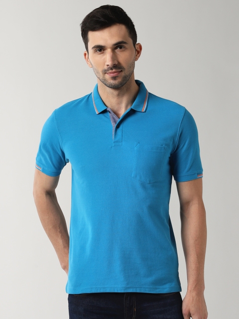 

Peter England Men Blue Solid Polo Collar T-shirt