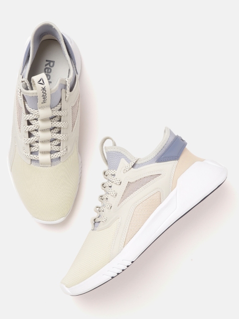 

Reebok Women Off White Solid Freestyle Motion Lo Training Shoes