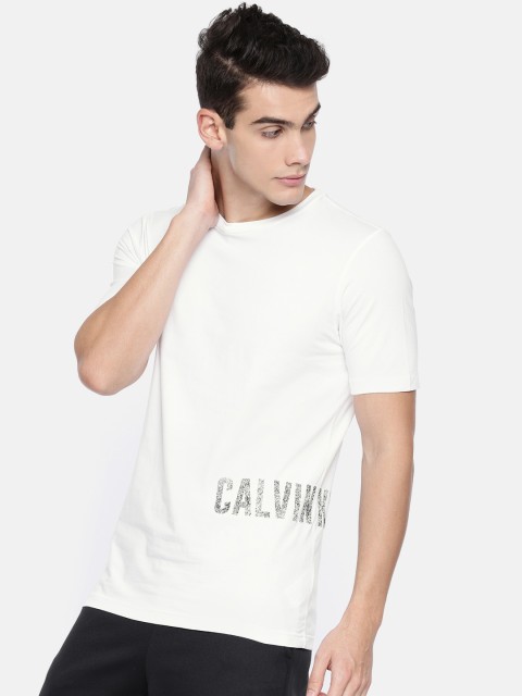 

Calvin Klein Jeans Men White Solid Round Neck T-shirt With Printed Detailing