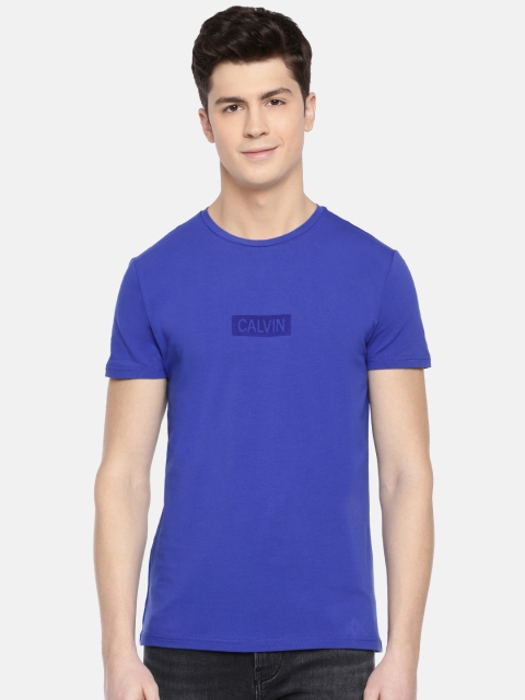 

Calvin Klein Jeans Men Blue Solid Round Neck T-shirt