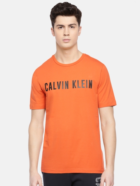 

Calvin Klein Jeans Men Orange Printed Round Neck T-shirt