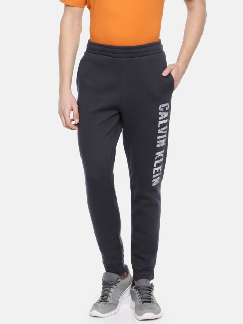 

Calvin Klein Jeans Men Navy Blue Solid Straight Fit Joggers