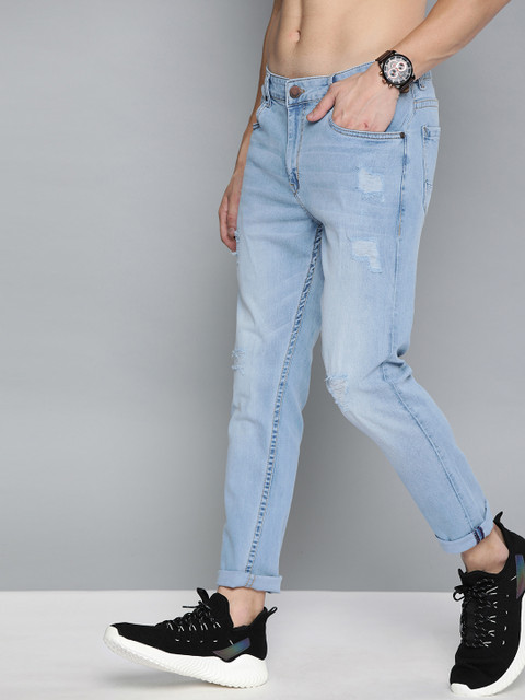 

HERE&NOW Men Blue Ankle Slim Tapered Fit Mid-Rise Highly Distressed Stretchable Jeans