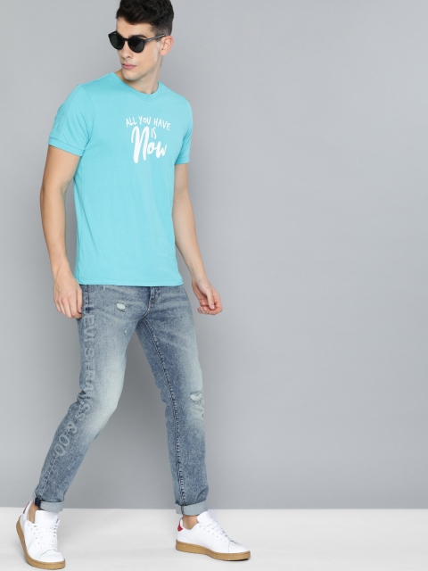 

Levis Men Blue 512 Slim Tapered Fit Mid-Rise Low Distress Stretchable Jeans