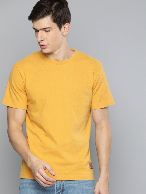

Levis Men Mustard Yellow Solid Round Neck T-shirt