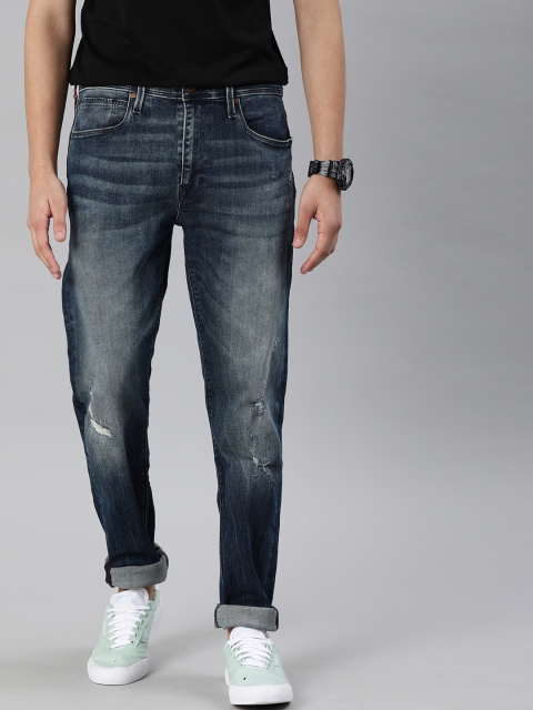 

Levis Men Blue Tapered Fit Mid-Rise Low Distress Stretchable Jeans