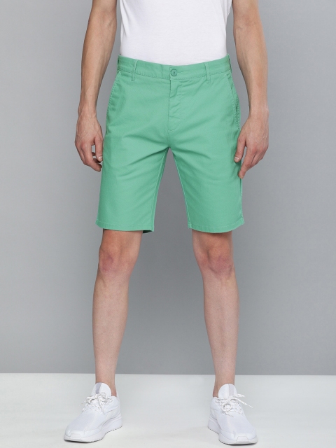 

Levis Men Green Solid Tapered Fit Regular Shorts
