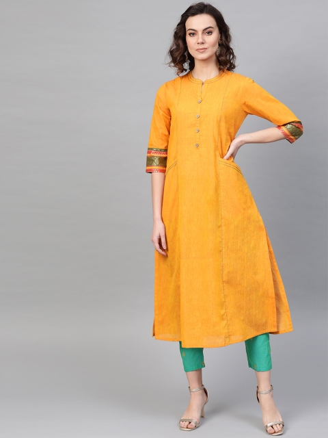 

PINKSKY Women Mustard Yellow & Green Solid Kurta with Trousers