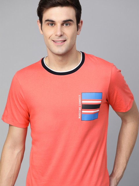 

Mast & Harbour Men Coral Pink Solid Round Neck T-shirt