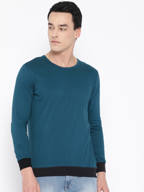 

Unisopent Designs Men Teal Blue Solid Round Neck T-shirt