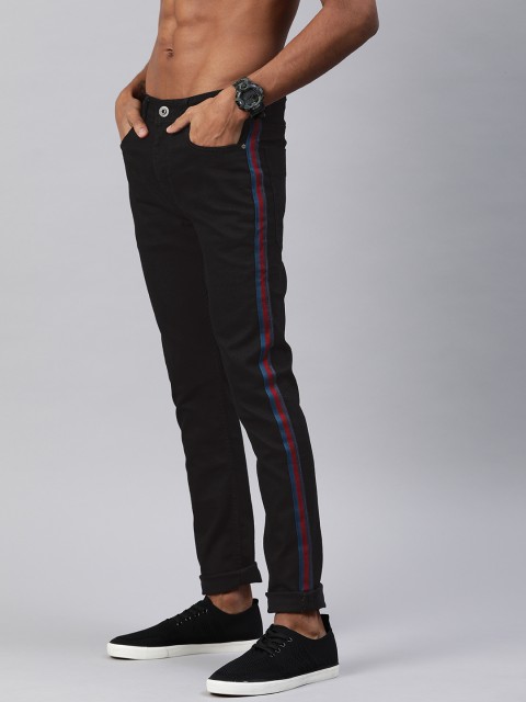 

Roadster Men Black Skinny Fit Mid-Rise Clean Look Stretchable Jeans with Side Stripe