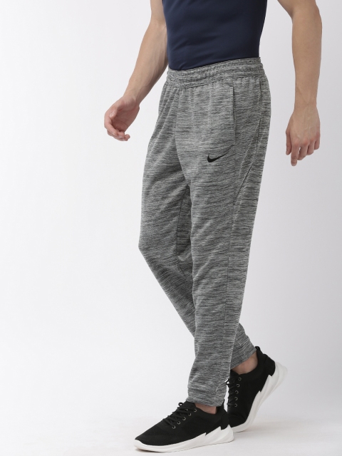 

Nike Men Grey Melange Solid Nk Spotlight Straight Fit DRI FIT Basketball Track Pants