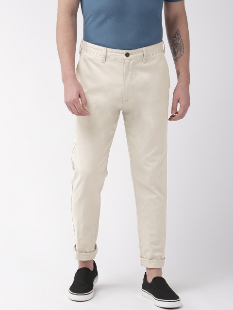

Marks & Spencer Men Off-White Tapered Fit Solid Chinos