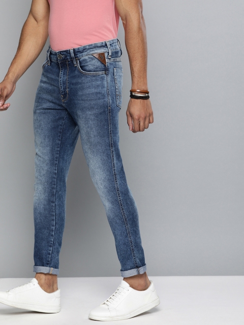 

Wrangler Men Blue Bostin Slim Tapered Fit Mid-Rise Clean Look Stretchable Crop Jeans
