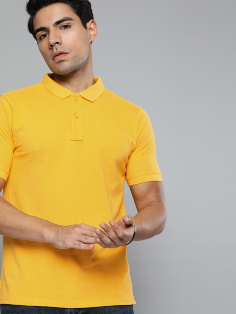 

Wrangler Men Mustard Yellow Solid Polo Collar T-shirt