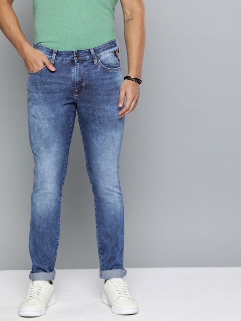 

Wrangler Men Blue Skanders Slim Tapered Fit Low-Rise Clean Look Stretchable Jeans