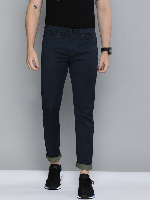 

Lee Men Navy Blue Travis Slim Narrow Fit Mid-Rise Clean Look Stretchable Jeans