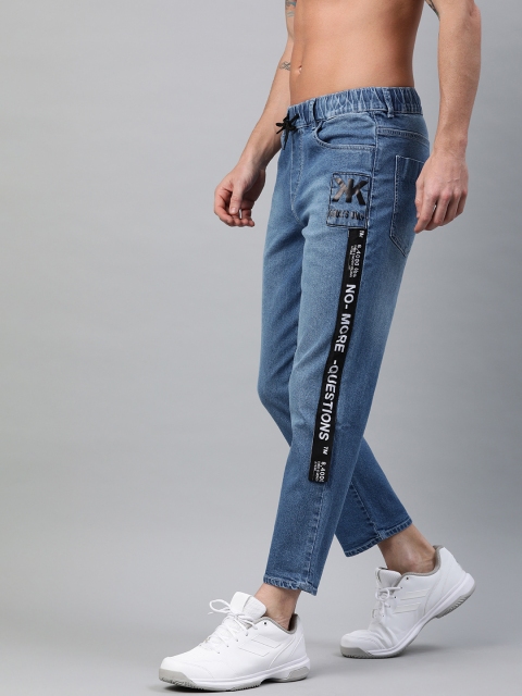 

Kook N Keech Men Blue Regular Mid-Rise Clean Look Stretchable Cropped Jeans With Applique