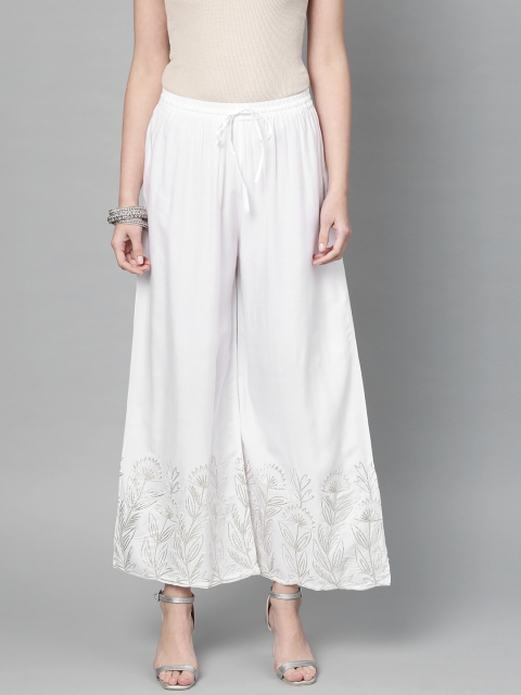 

Ishin Women White Embroidered Flared Palazzos