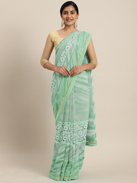 

Triveni Sea Green Solid Net Saree With Embellished Detail