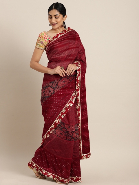 

Triveni Maroon & Gold-Toned Net Embellished Saree With Lace Detailing