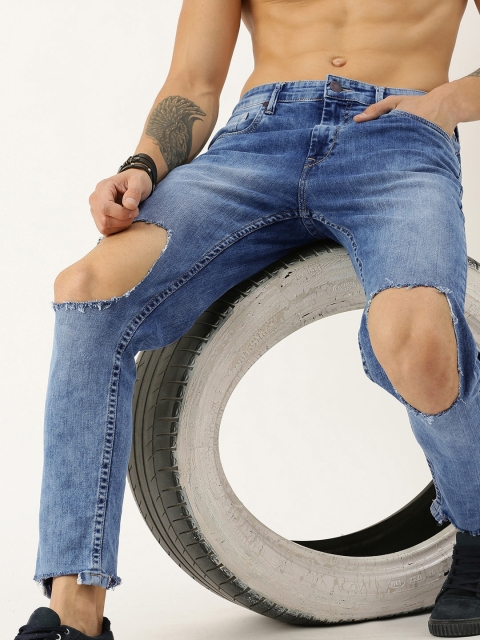 

Moda Rapido Men Blue Slim Fit Mid-Rise Highly Distressed Stretchable Ankle-Length Jeans