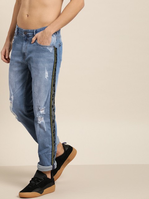 

Moda Rapido Men Blue Slim Fit Mid-Rise Mildly Distressed Jeans With Side Stripes