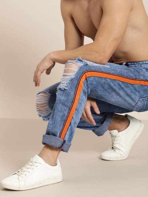

Moda Rapido Men Blue Slim Fit Mid-Rise Highly Distressed Jeans